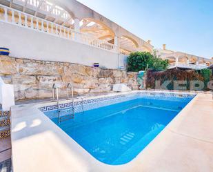 Swimming pool of Single-family semi-detached for sale in El Campello  with Air Conditioner, Terrace and Swimming Pool