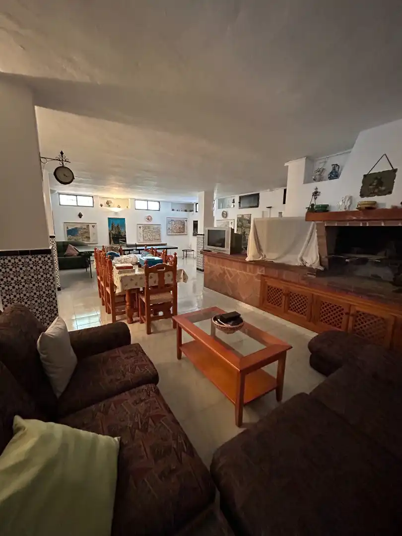 Sala d'estar de Casa adosada en venda en Vélez-Málaga amb Aire condicionat, Calefacció i Jardí privat
