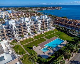 Vista exterior de Apartament en venda en Orihuela amb Aire condicionat, Jardí privat i Moblat