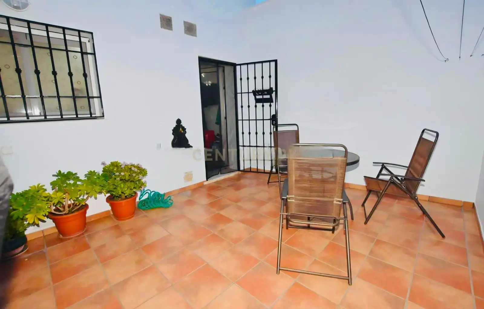 Jardí de Casa adosada en venda en Cuevas del Becerro amb Aire condicionat i Alarma