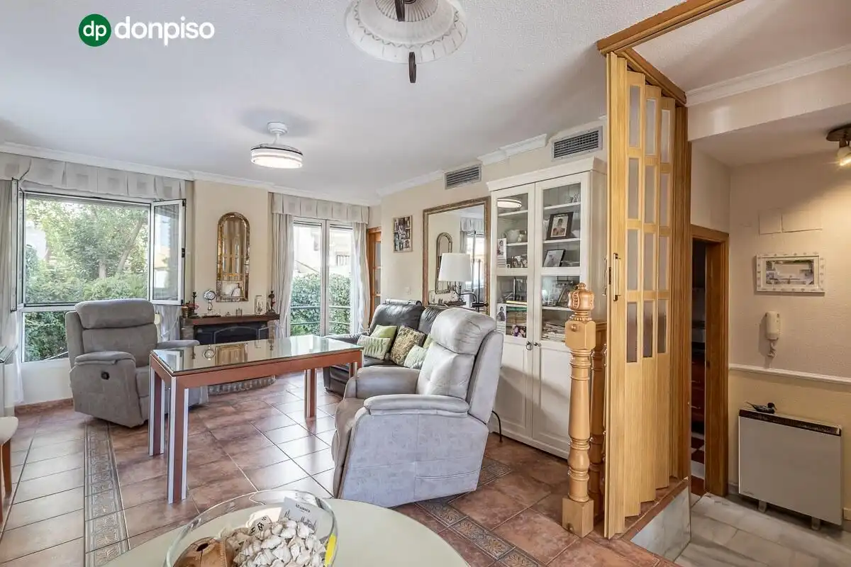 Sala de estar de Casa adosada en venta en Genil
