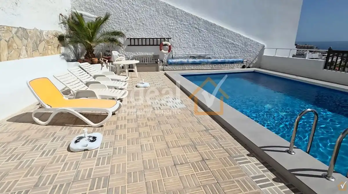 Piscina de Casa adosada en venta en Santiago del Teide con Terraza, Amueblado y Piscina comunitaria