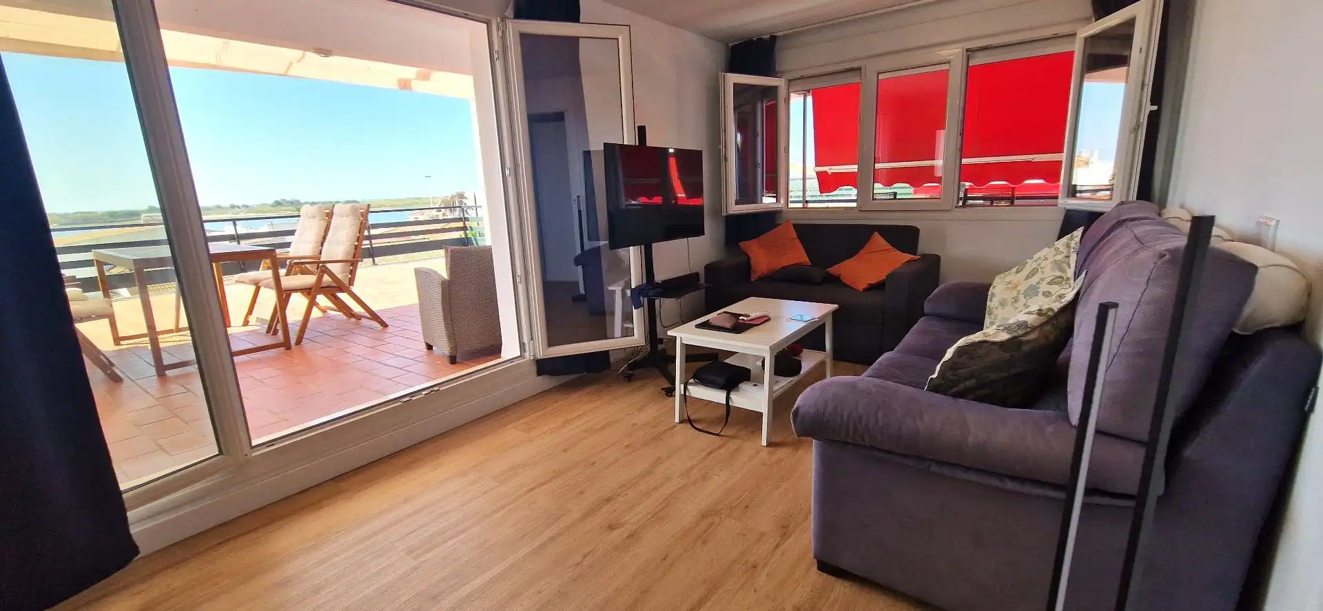 Wohnzimmer von Wohnung zur Miete in El Rompido mit Klimaanlage, Terrasse und Gemeinschaftspool