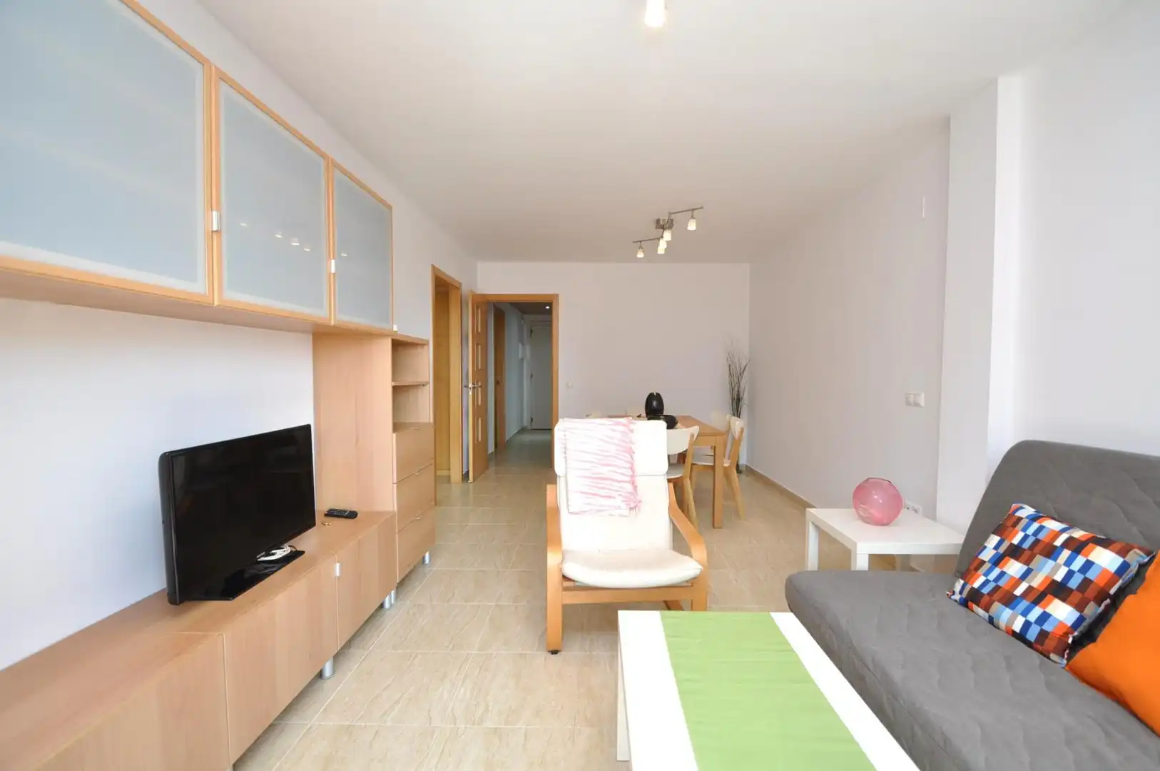 Sala de estar de Apartamento en venta en La Ràpita con Amueblado y Piscina comunitaria