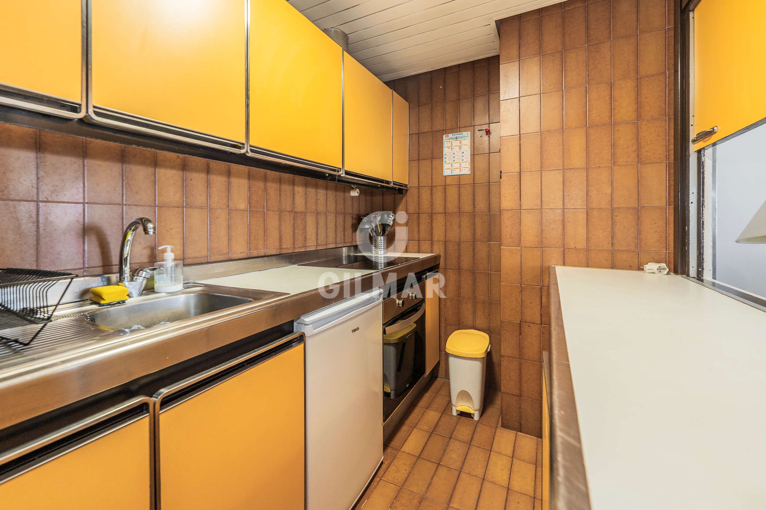 Kitchen of Apartment for sale in  Madrid Capital  with Heating, Private garden and Storage room