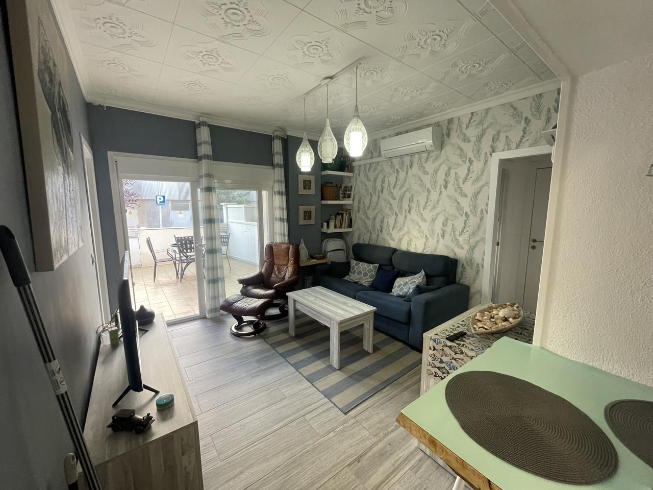 Living room of Planta baja for sale in Blanes  with Air Conditioner, Parquet flooring and Terrace