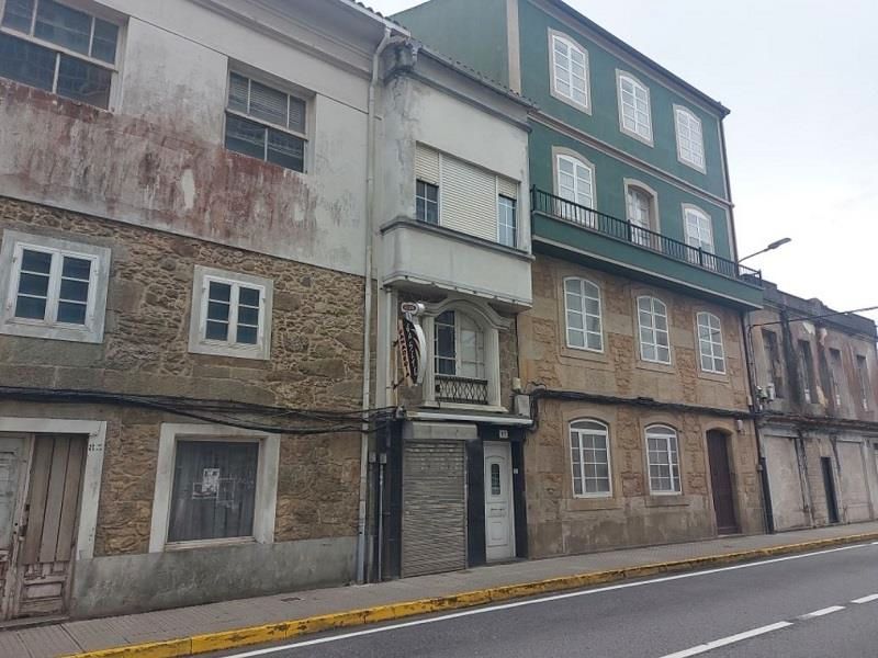 Vista exterior de Casa adosada en venda en Boiro amb Alarma