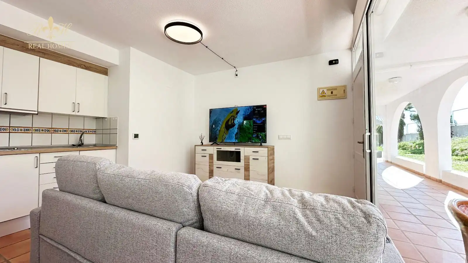 Sala de estar de Piso de alquiler en L'Alfàs del Pi con Aire acondicionado, Terraza y Piscina