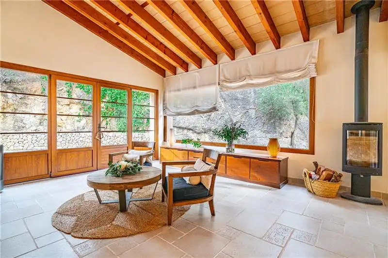 Sala d'estar de Casa o xalet en venda en Calvià amb Aire condicionat, Jardí privat i Terrassa