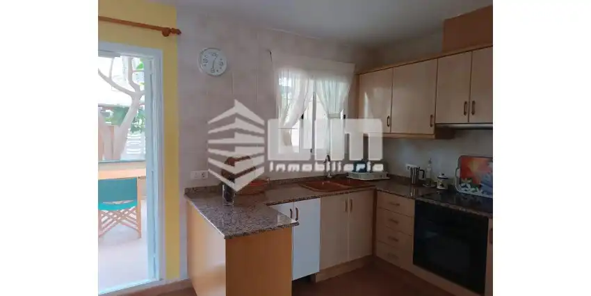 Cuina de Casa adosada en venda en Sagunto / Sagunt amb Terrassa