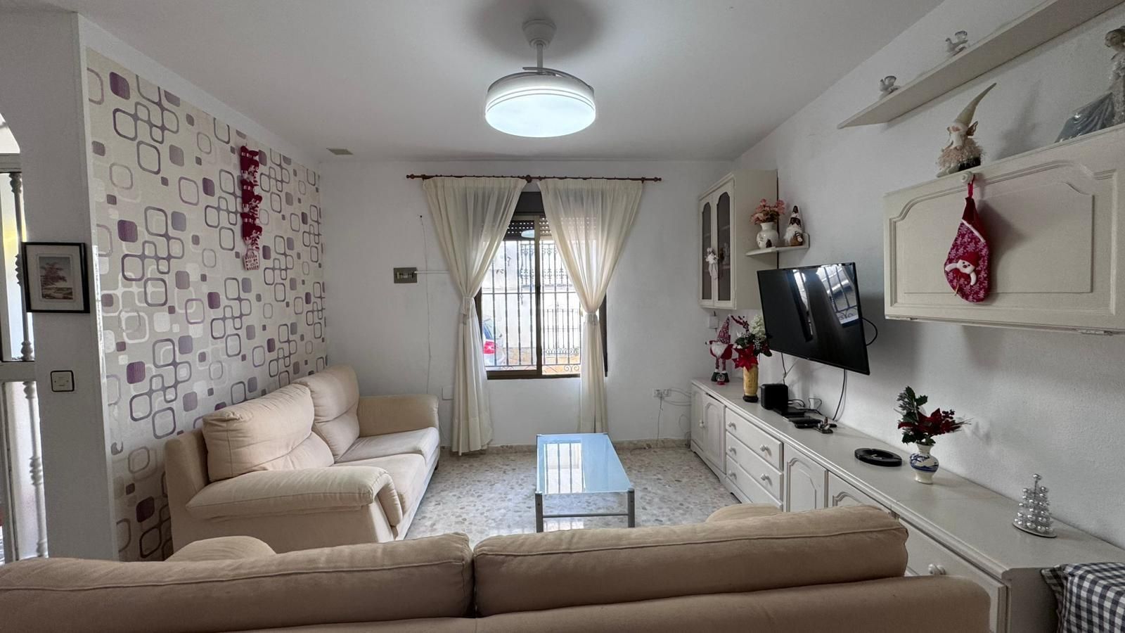 Sala d'estar de Casa adosada en venda en Colmenar amb Aire condicionat, Calefacció i Terrassa