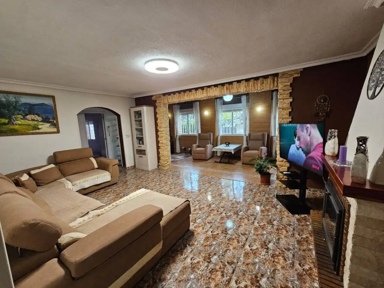Sala d'estar de Casa o xalet en venda en Alicante / Alacant amb Aire condicionat, Calefacció i Jardí privat