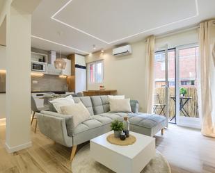 Living room of Flat for sale in  Madrid Capital  with Air Conditioner and Balcony