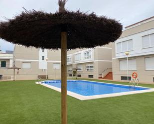 Piscina de Casa adosada en venda en Moncofa amb Aire condicionat, Jardí privat i Terrassa