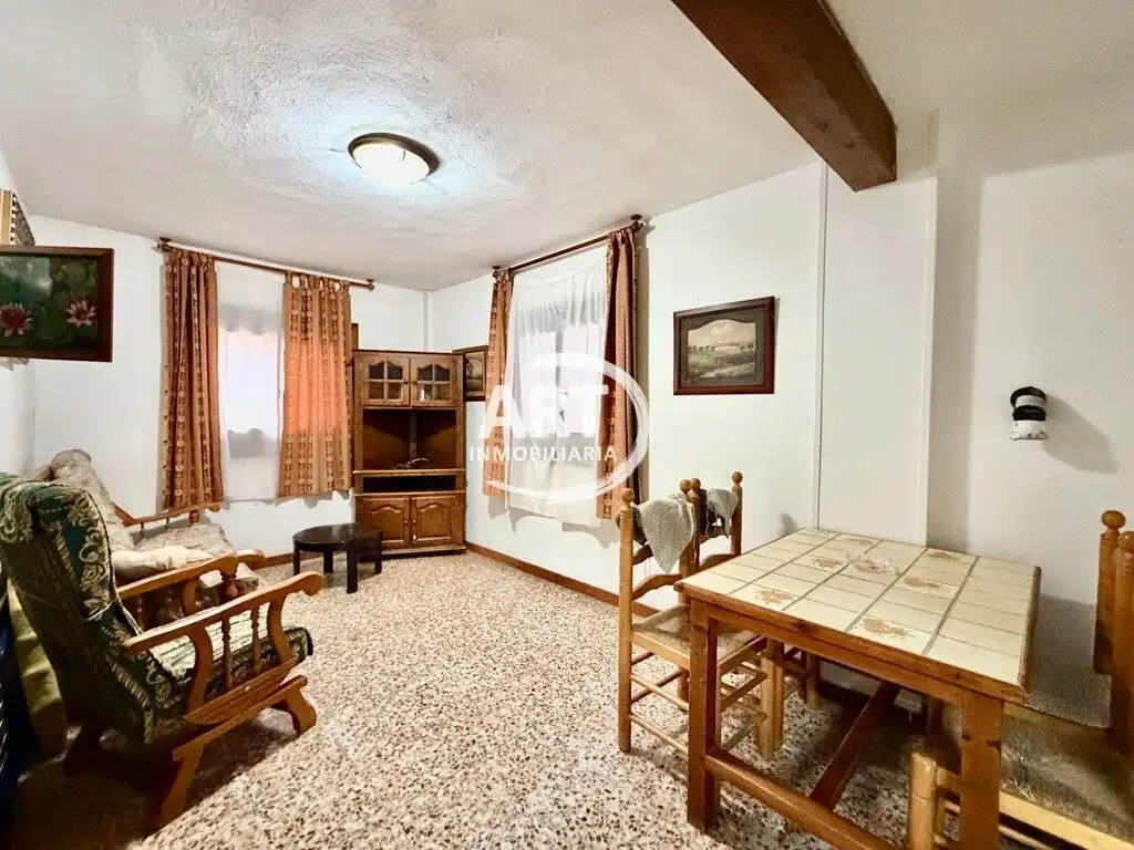 Sala d'estar de Finca rústica en venda en Alcalá de la Selva amb Calefacció i Moblat