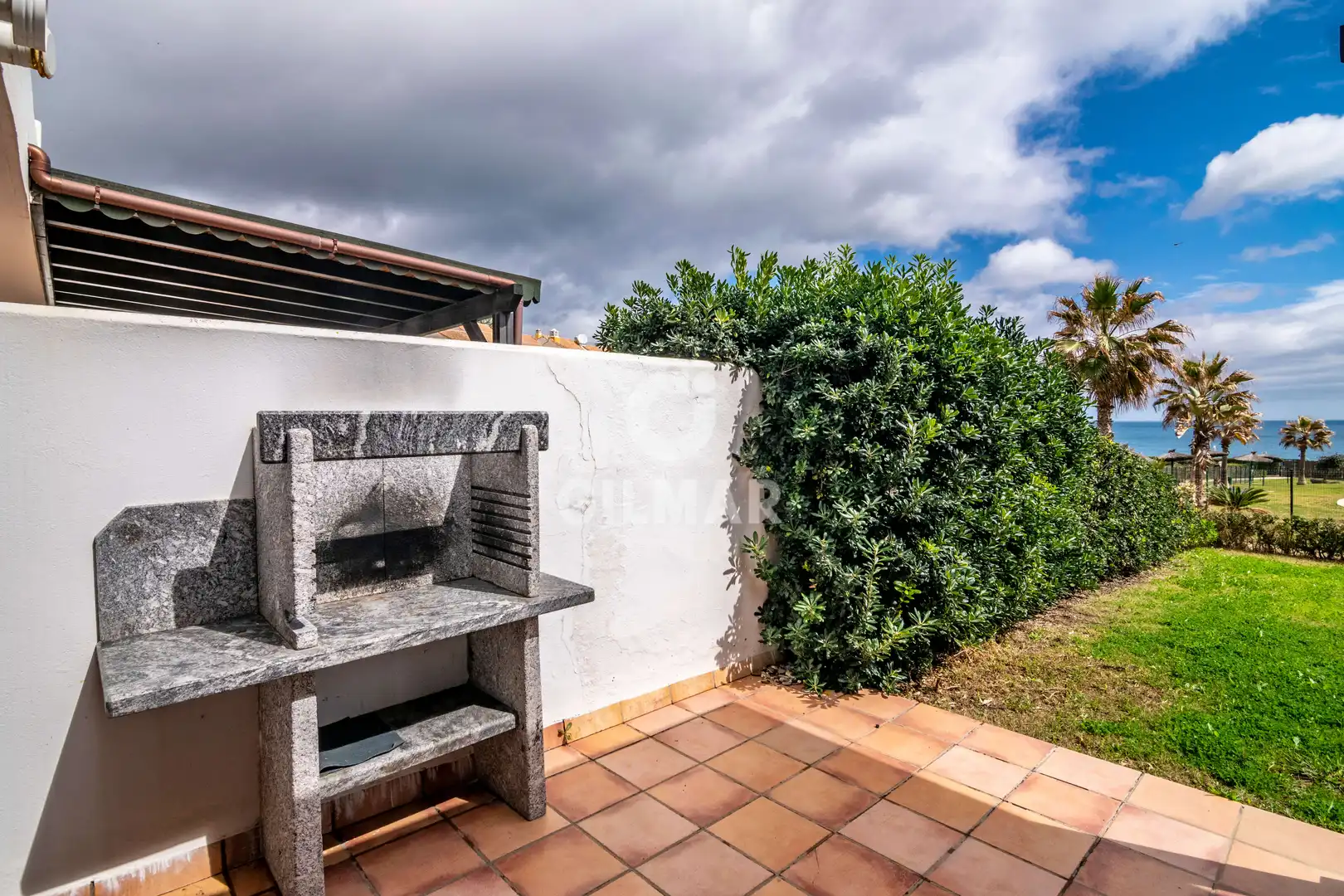 Garten von Einfamilien-Reihenhaus zum Verkauf in Manilva mit Heizung, Privatgarten und Schwimmbad