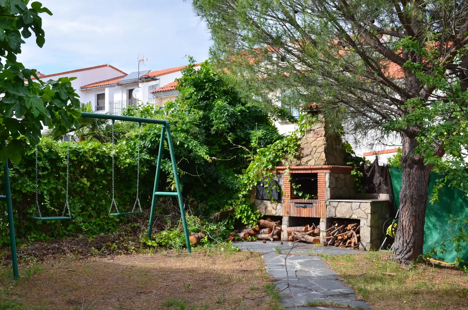 Garden of Houses for sale in Plasencia  with Air Conditioner
