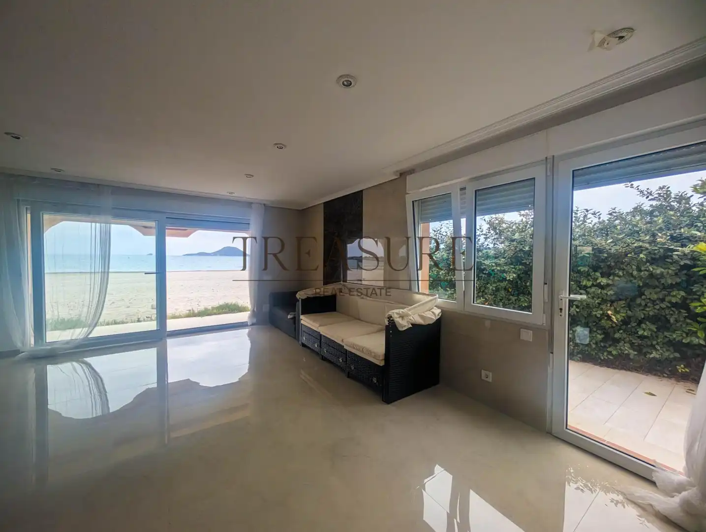Living room of Houses for sale in La Manga del Mar Menor  with Air Conditioner, Private garden and Terrace