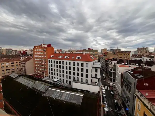 Vista exterior de Àtic en venda en Gijón  amb Calefacció i Terrassa