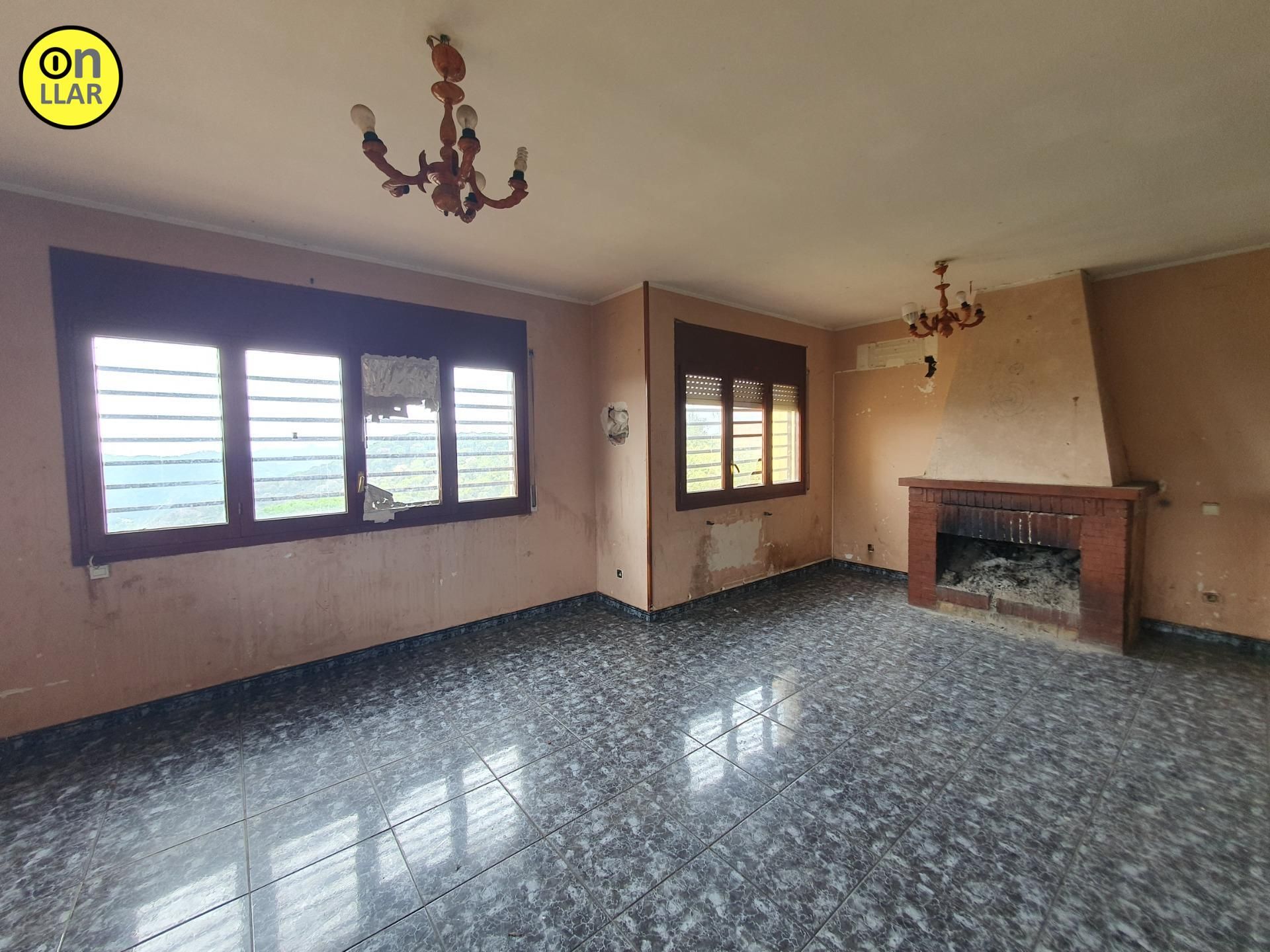 Sala d'estar de Casa o xalet en venda en Dosrius