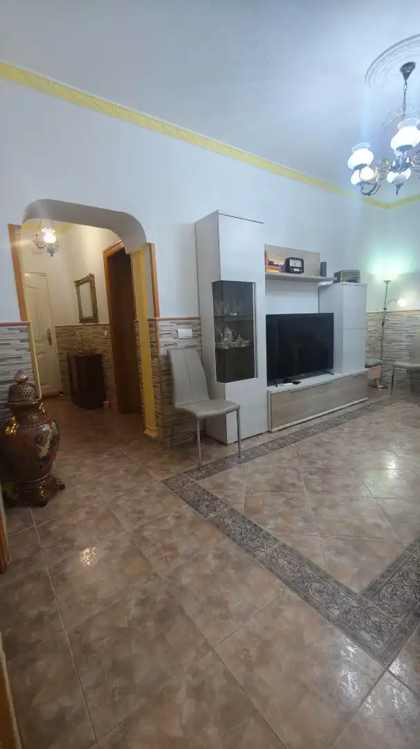 Sala d'estar de Casa adosada en venda en Roquetas de Mar amb Aire condicionat i Moblat