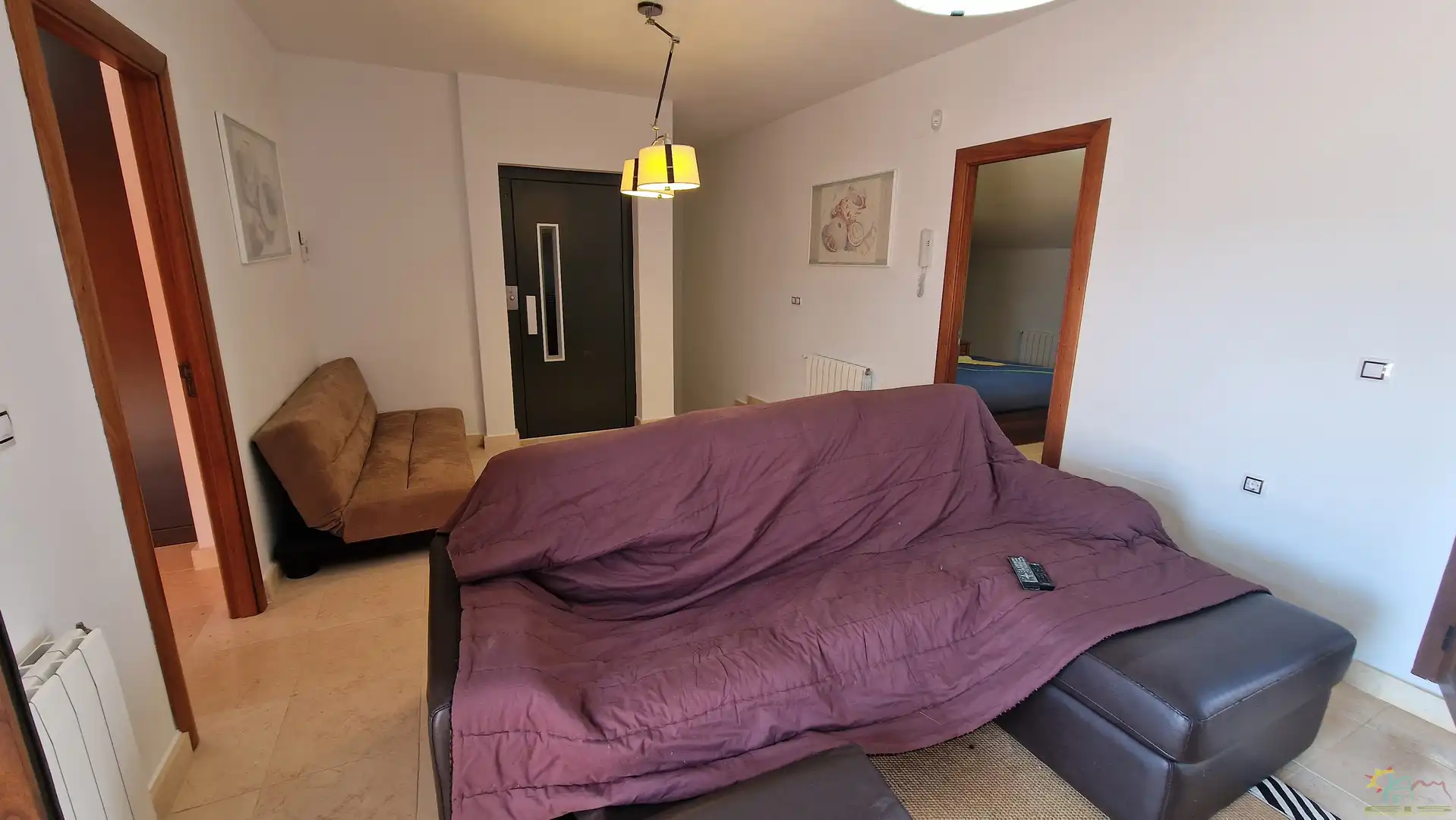 Wohnzimmer von Einfamilien-Reihenhaus zum Verkauf in Diezma mit Klimaanlage, Heizung und Privatgarten