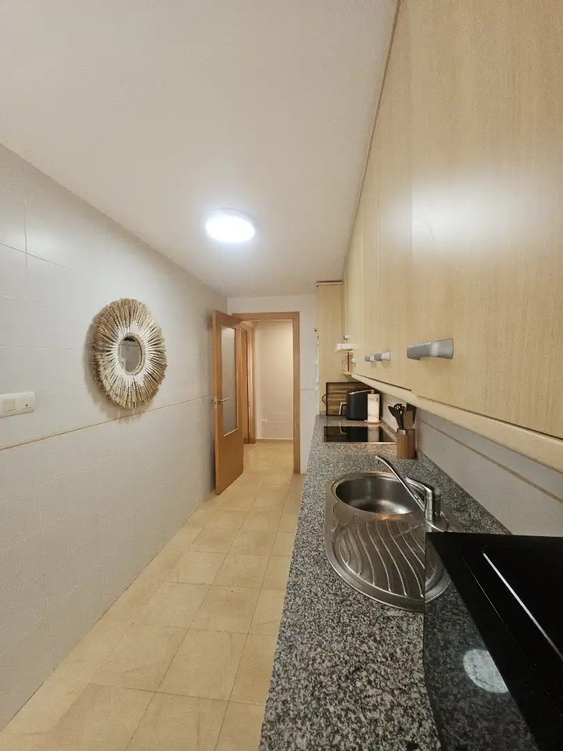 Cocina de Piso en venta en La Manga del Mar Menor con Jardín privado, Terraza y Piscina
