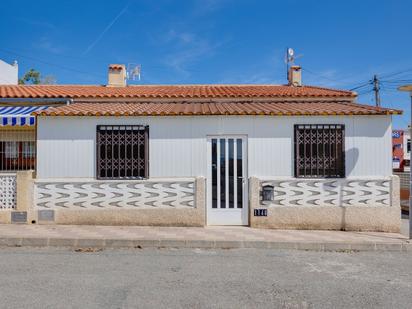 Vista exterior de Casa adosada en venda en San Fulgencio amb Terrassa i Piscina comunitària