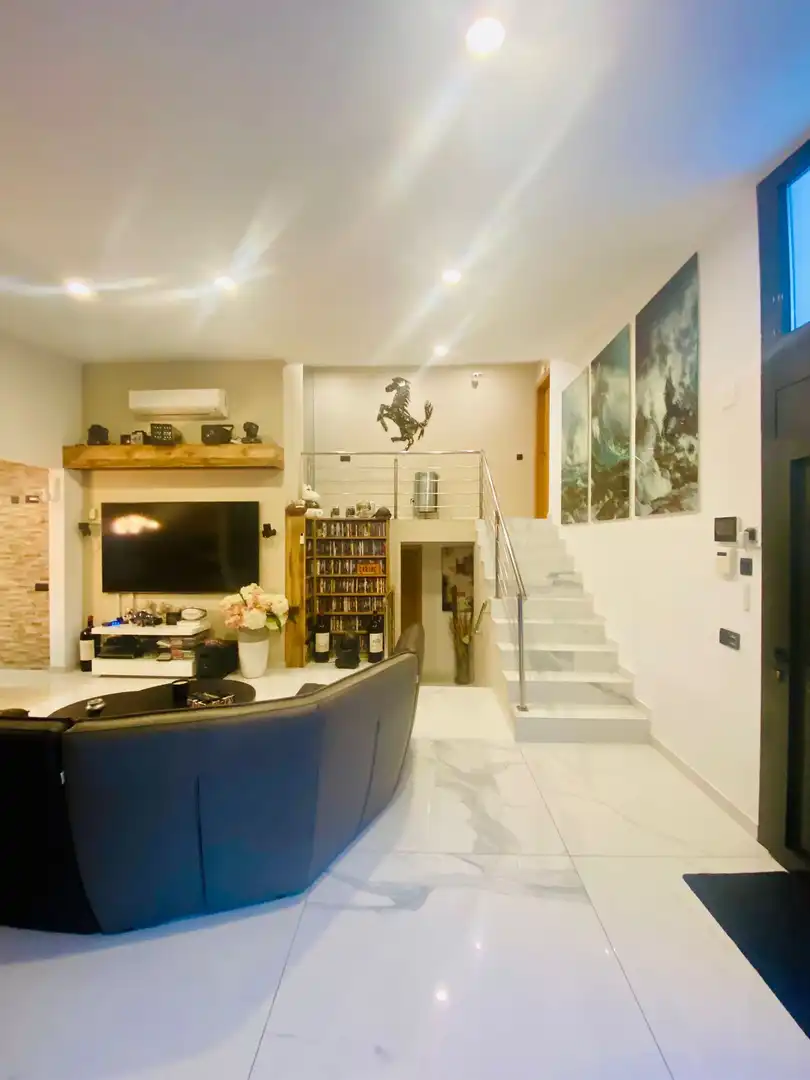 Sala d'estar de Casa adosada en venda en Empuriabrava amb Aire condicionat, Calefacció i Jardí privat