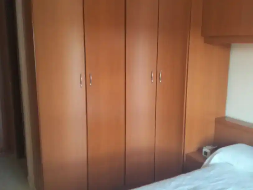 Bedroom of Flat for share in Sevilla  with Air Conditioner, Swimming Pool and Furnished