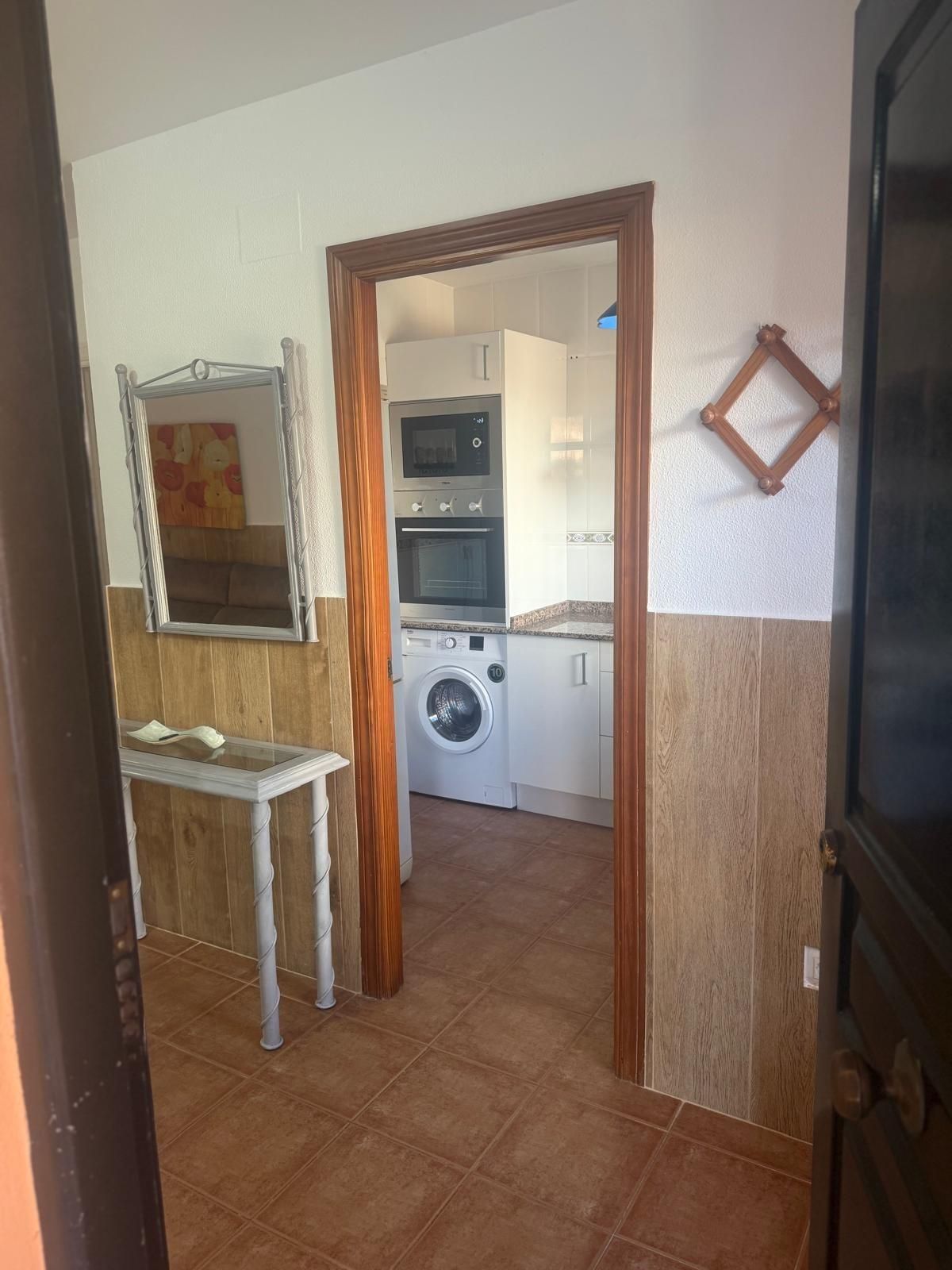 Cuina de Planta baixa en venda en Chiclana de la Frontera amb Jardí privat, Terrassa i Piscina comunitària