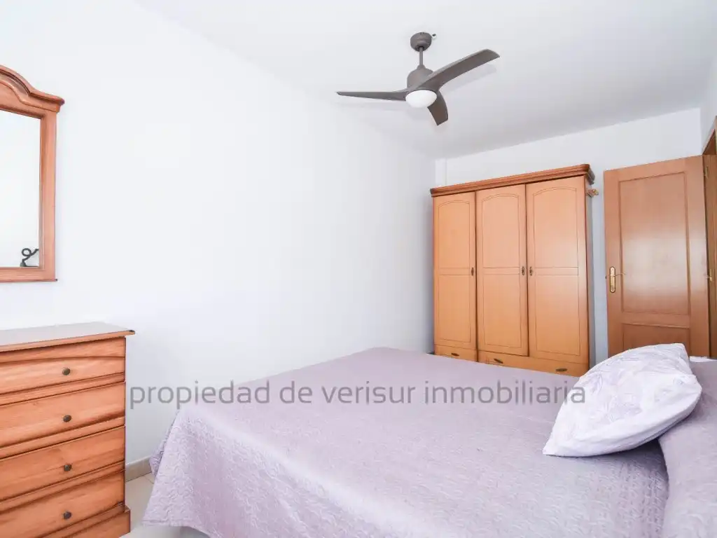 Dormitori de Apartament de lloguer en Águilas amb Terrassa, Piscina i Moblat