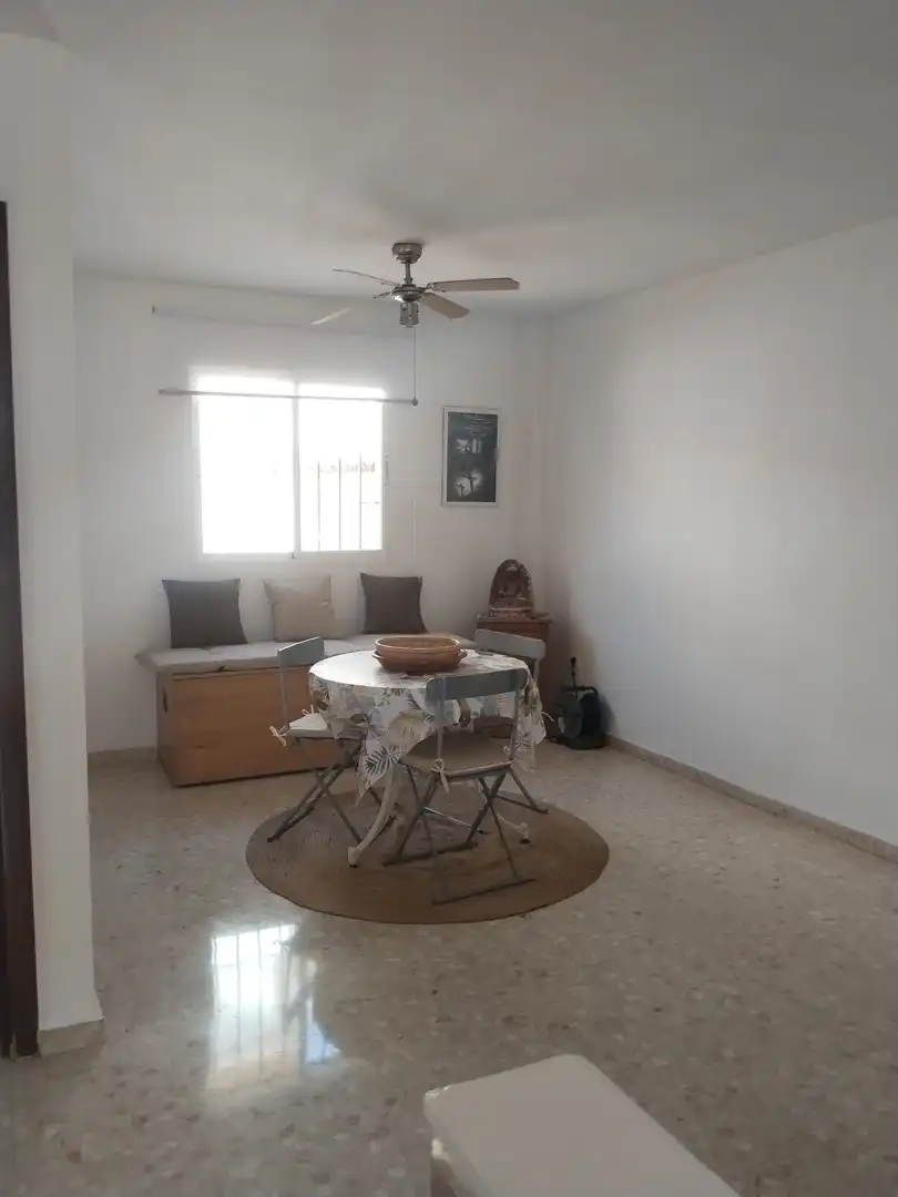 Sala de estar de Casa adosada en venta en Churriana