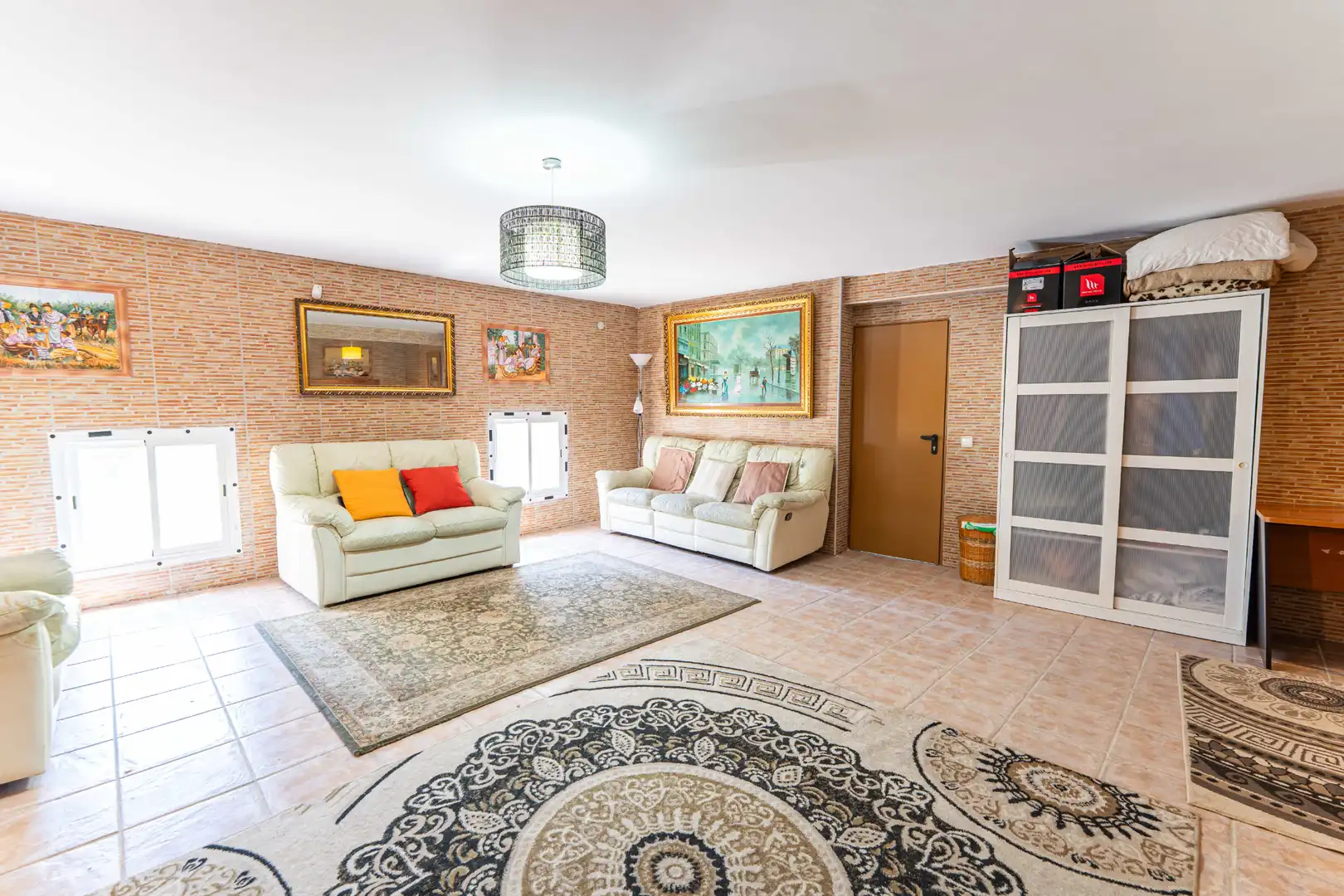Sala de estar de Casa adosada en venta en Torrelodones con Calefacción, Jardín privado y Terraza