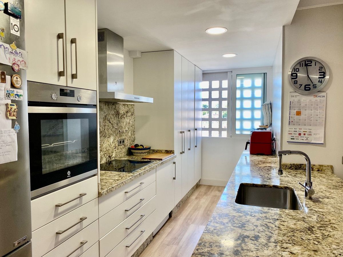 Kitchen of Duplex for sale in Marbella  with Air Conditioner, Terrace and Storage room