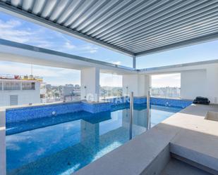 Swimming pool of Duplex for sale in  Madrid Capital  with Terrace, Storage room and Swimming Pool