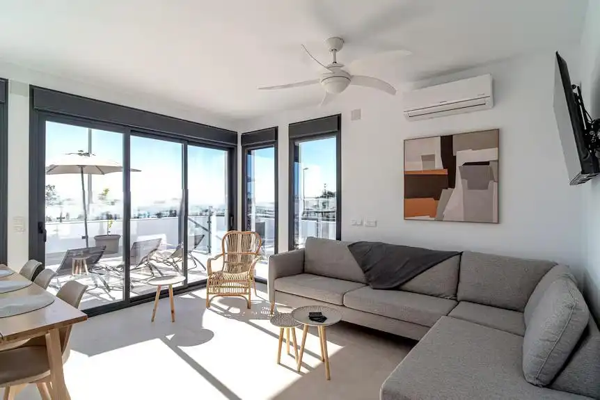 Sala de estar de Casa o chalet en venta en Nerja con Aire acondicionado, Terraza y Piscina