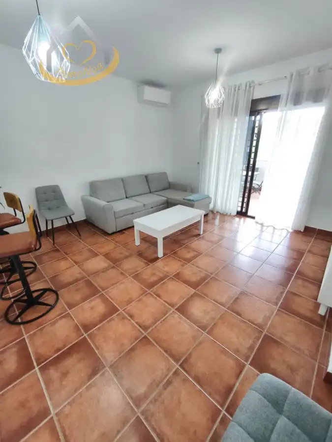 Sala de estar de Apartamento en venta en El Rompido con Aire acondicionado, Terraza y Amueblado