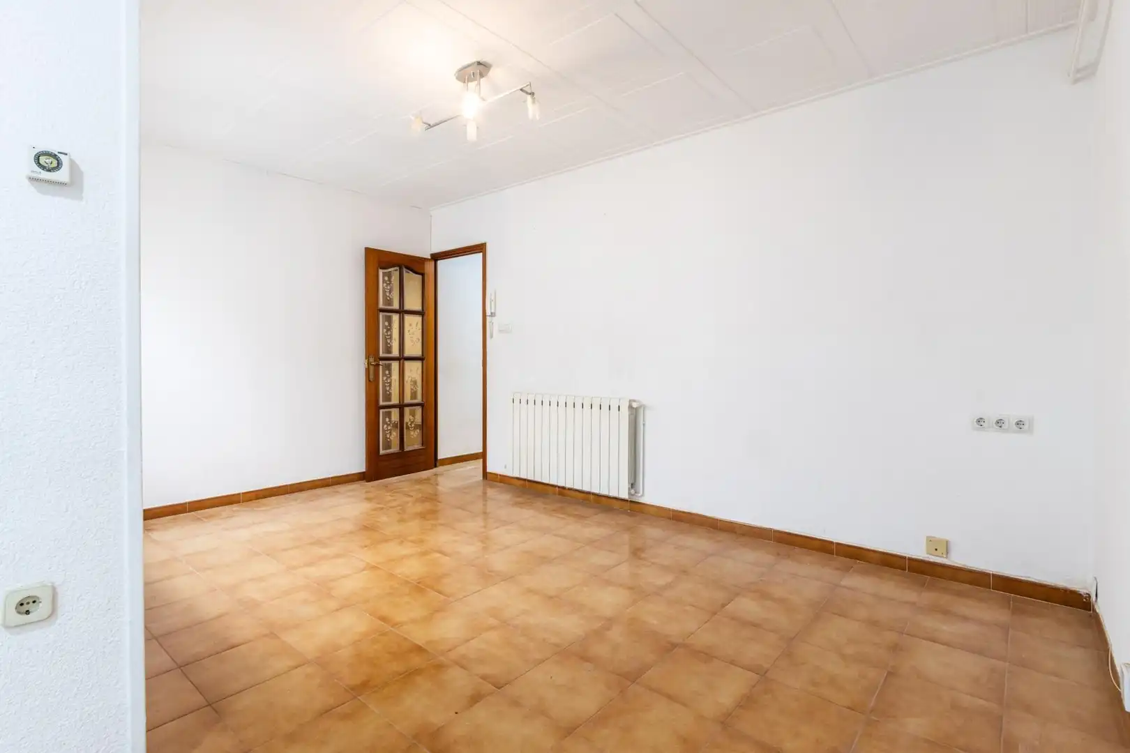 Sala d'estar de Casa adosada en venda en Terrassa amb Terrassa i Traster