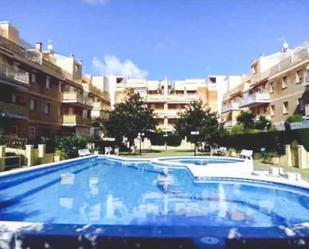 Swimming pool of Planta baja for sale in Cunit  with Air Conditioner, Heating and Private garden