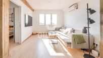 Living room of Flat for sale in  Madrid Capital  with Air Conditioner, Heating and Private garden