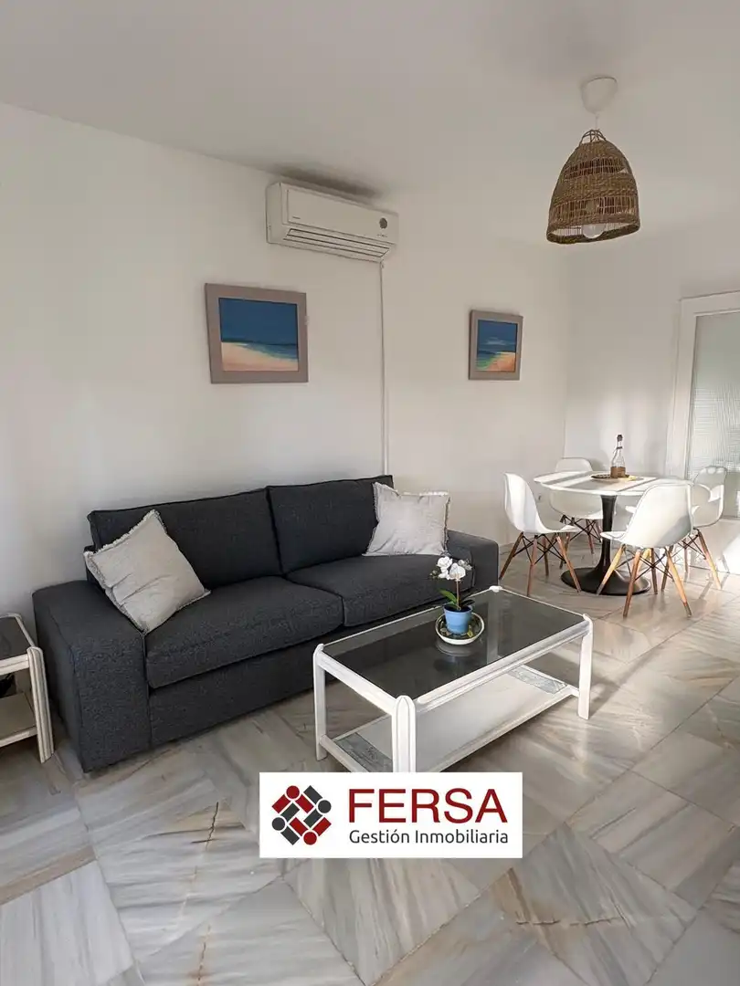 Living room of Flat for rent in El Puerto de Santa María  with Air Conditioner, Private garden and Furnished