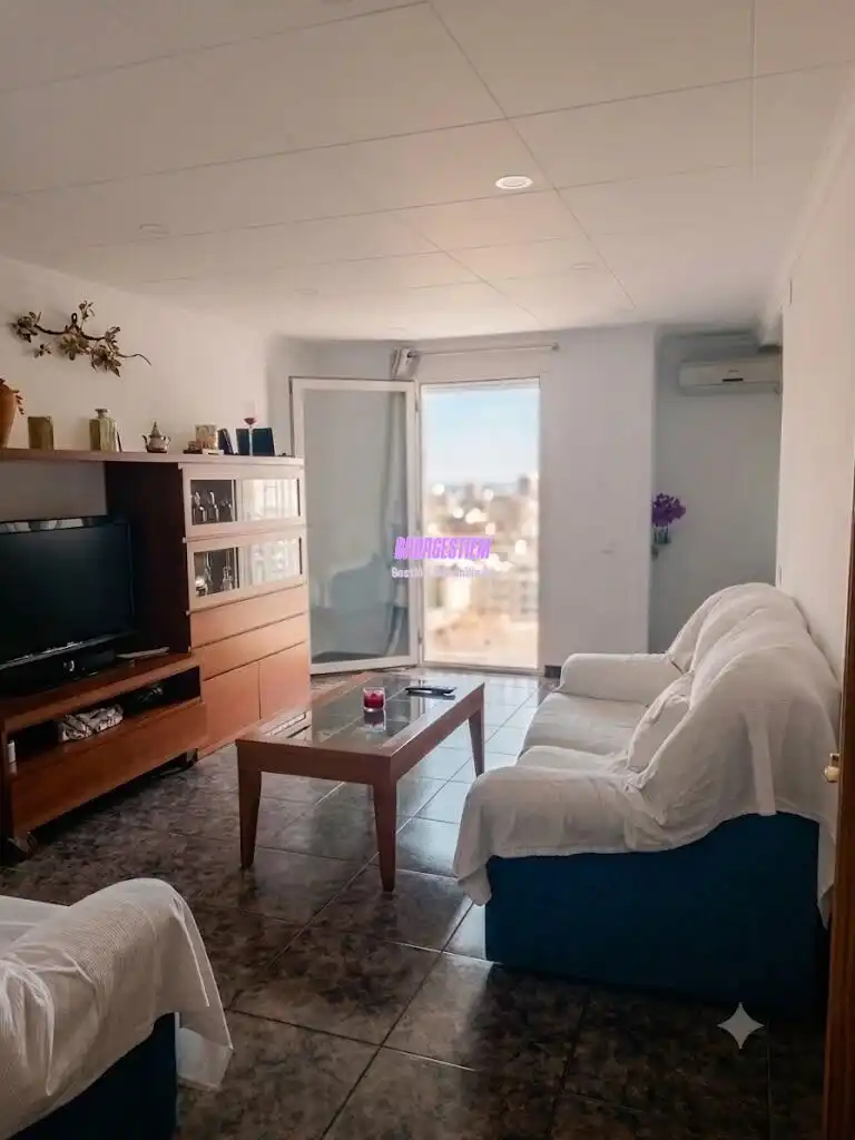 Sala d'estar de Pis de lloguer en La Ràpita amb Aire condicionat, Terrassa i Moblat