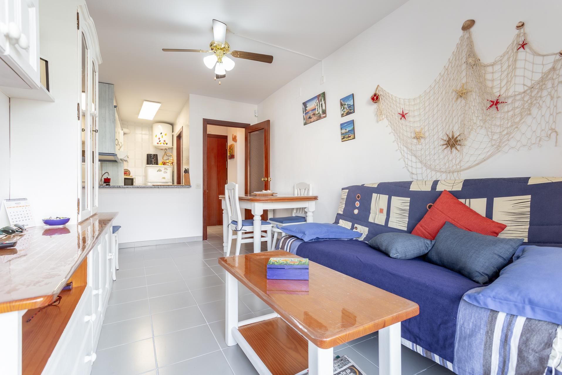 Sala d'estar de Apartament en venda en Salou amb Jardí privat i Piscina