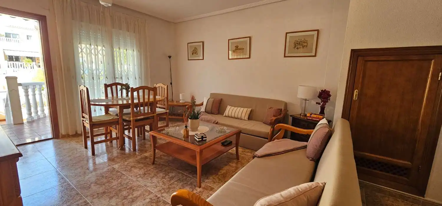 Sala de estar de Dúplex en venta en Orihuela con Terraza, Piscina y Amueblado