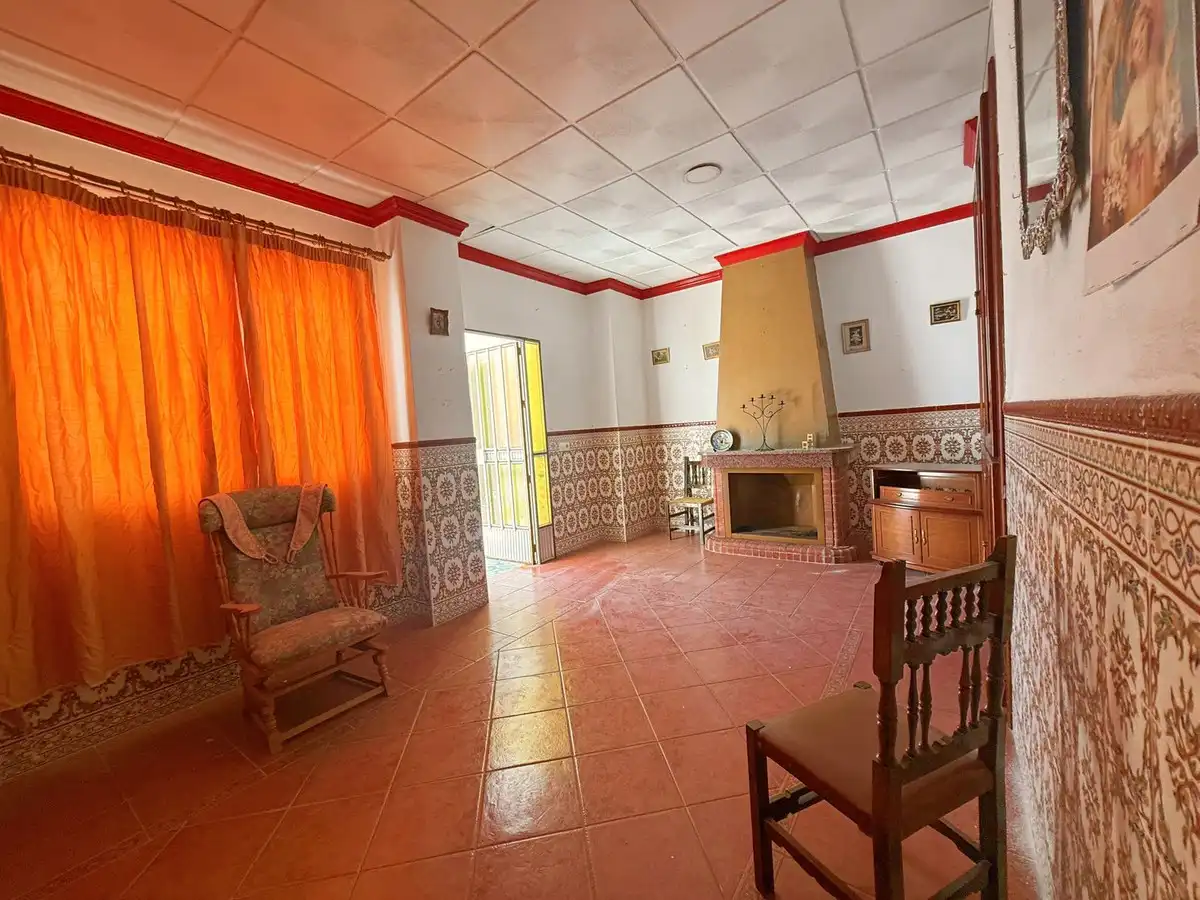 Sala de estar de Casa adosada en venta en Benamejí con Jardín privado, Terraza y Trastero
