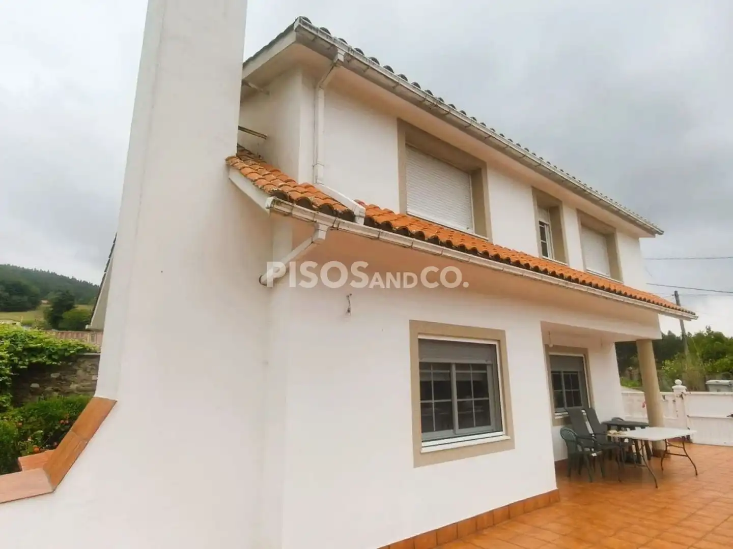 Vista exterior de Casa o xalet en venda en Abegondo amb Calefacció, Terrassa i Piscina