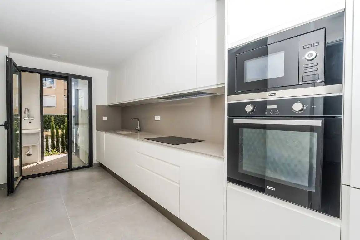 Kitchen of Flat for sale in Jávea / Xàbia  with Air Conditioner, Private garden and Storage room