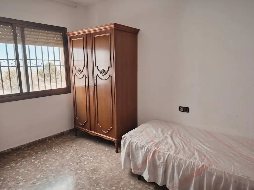 Dormitori de Casa adosada en venda en Almería amb Aire condicionat, Terrassa i Moblat