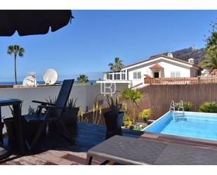 Vista exterior de Casa adosada de lloguer en Santiago del Teide amb Jardí privat, Terrassa i Piscina